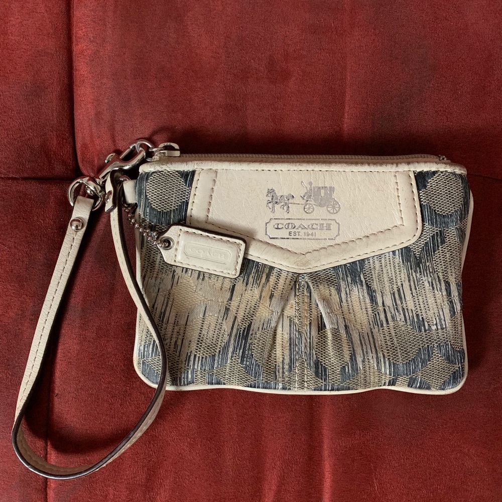 COACH women’s wristlet handbag.